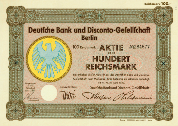 Ein altes deutsches Banknotenbild mit einer Vogeldarstellung und der Aufschrift "Deutsche Bank und Disconto-Gesellichaft Berlin".