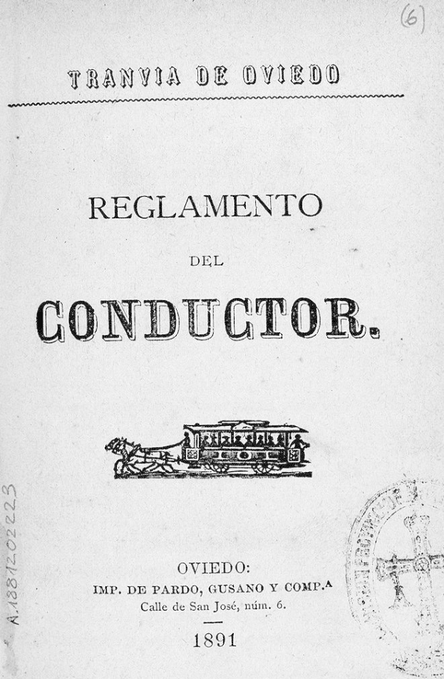 Altes Buch mit dem Titel "Reglamento de Conductor" und einer Zeichnung eines Zuges auf dem Titelbild und einem Stempel auf der rechten Seite.