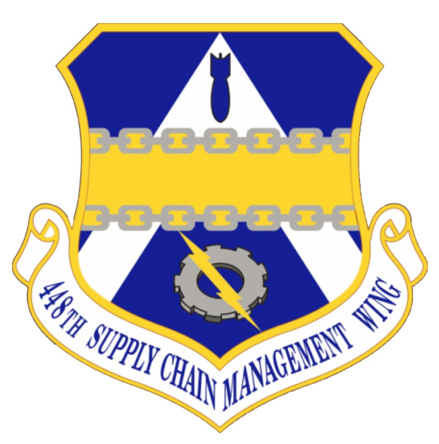 Logo der 48. Versorgungsmanagementstaffel mit einem blauen Schild mit einem weißen Stern und einem weißen Banner mit der Aufschrift "Versorgungsmanagement" in Blau, alles von einem weißen Rand umgeben und mit dem Text "48. Versorgungsmanagementstaffel" in fetter schwarzer Schrift.