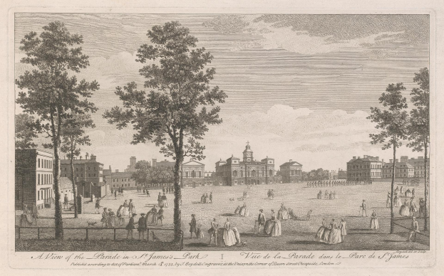 Eine Gruppe von Menschen, die in St. James Park stehen und sitzen, mit Bäumen und Gebäuden im Hintergrund, unter einem bewölkten Himmel und Text am unteren Bildrand.