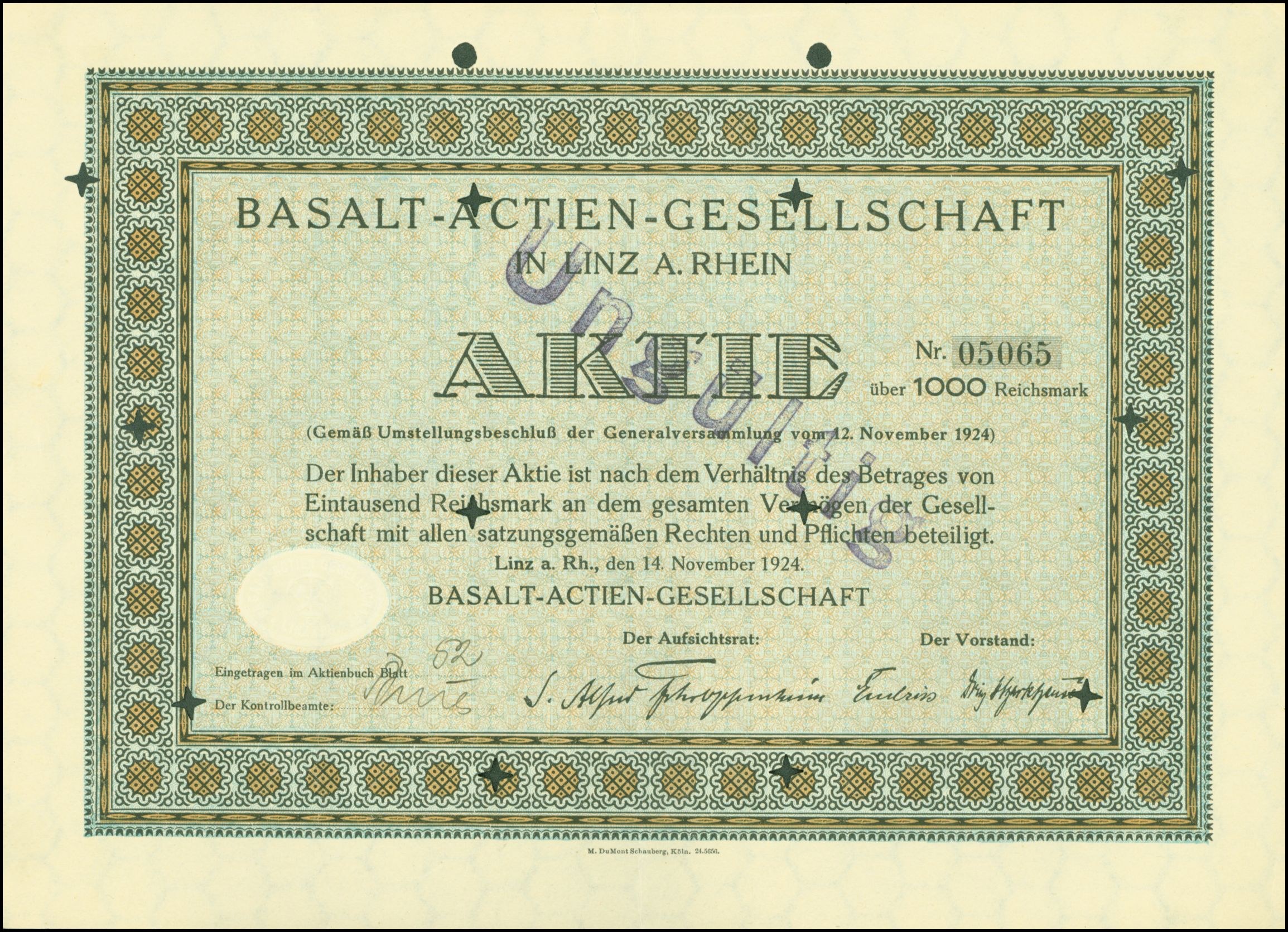 Rahmendes altes Aktienzertifikat ausgestellt von Basalt-Actien-Gesellschaft in Linz, Deutschland, mit sichtbarem Text.