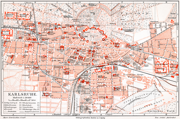 Ein detaillierter Stadtplan von Karlsruhe, Deutschland aus dem Jahr 1900, mit Text und umfassender Stadtanlage.