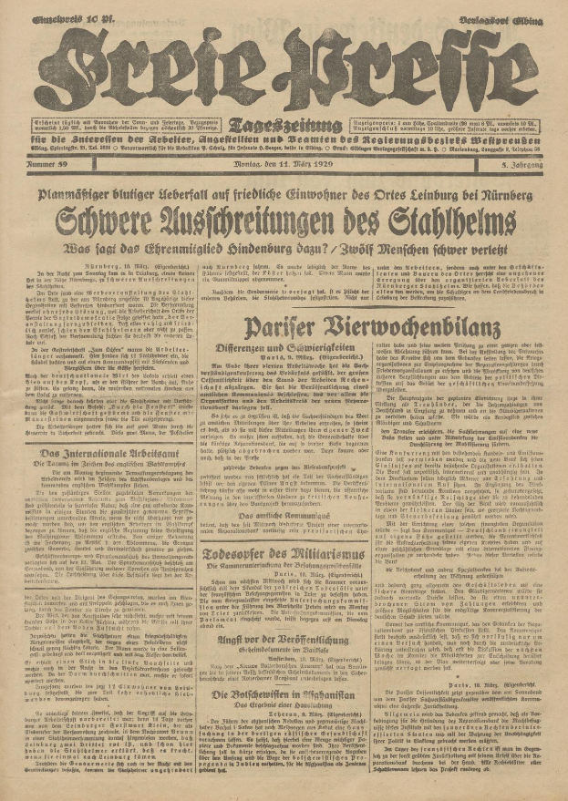 Schwarze und weiße Titelseite einer alten deutschen Zeitung mit einem ernst dreinblickenden Mann, der direkt in die Kamera schaut.