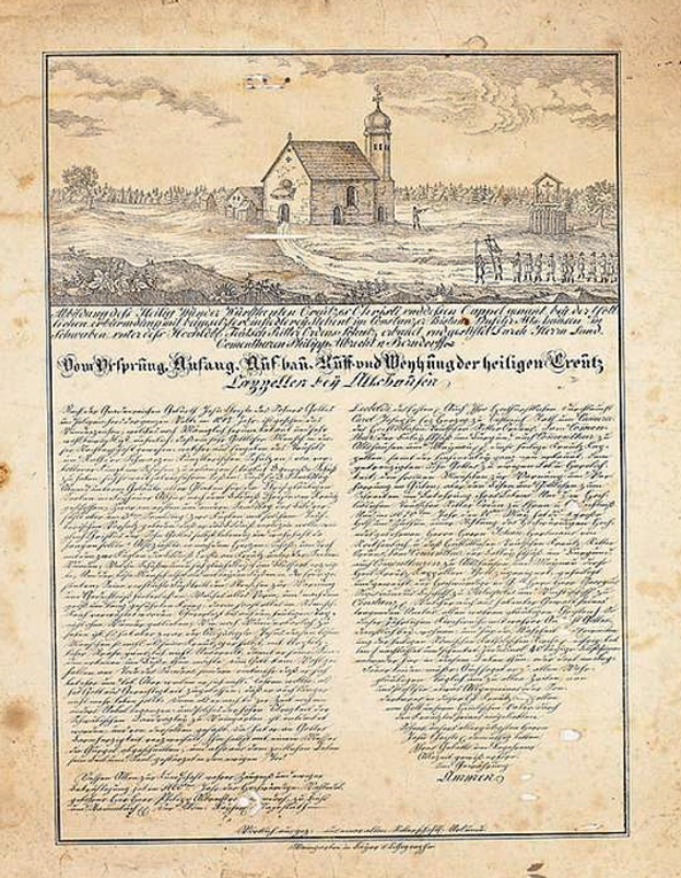 Ein historisches Dokument mit einer Zeichnung einer Kirche in der Mitte, umgeben von Bäumen und einem klaren blauen Himmel, mit Text aus der ersten Fassung der deutschen Verfassung.